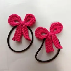 濃いめピンクのリボン型ヘアゴム２個セット