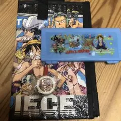 ワンピースのビニールバックとテープと分度器、15センチ定規、三角定規2種類のサムネイル