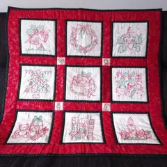 ケイトグリーナウェイの図案のレッド刺繍と生地のパッチワークキルト