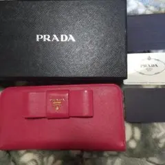 PRADA ラウンドファスナー リボン付き長財布ピンク系