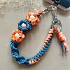 【ハンドメイド】パラコード お花のハンドストラップ｜スマホストラップ 橙ネイビー