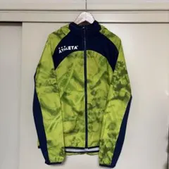 ATHLETA ピステ・ウィンドブレーカー グリーン/ネイビー