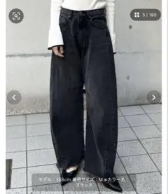 裾フリンジバレルレッグデニムパンツ