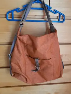 オレンジ 布地 バックパックスタイル ショルダーバッグ