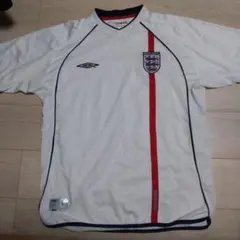 00s UMBRO ENGLAND ハーフジップ ゲームシャツ 在原みゆ紀 - メルカリ