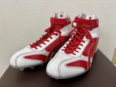 Brand new, unused ASICS baseball cleats, high-cut, red and white.