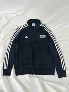 ADIDAS x OASIS ツアー ファイヤーバード トラックトップ M