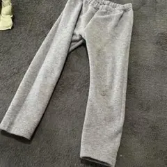 ユニクロキッズグレー 裏起毛長ズボンレギンスパンツ 小さな穴あり100
