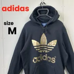 adidas アディダス 黒金パーカー スウェット フェードロゴ フーディー M