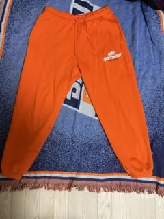 Nike オレンジ スウェットパンツ
