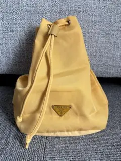 【美品】PRADA プラダ 巾着ポーチ ナイロン イエロー 三角ロゴ ミニバッグ