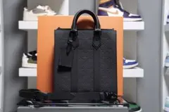 サックプラクロス　モノグラムトリヨンレザー　M21884 廃盤