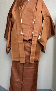 茶色の格子模様の紬アンサンブル着物