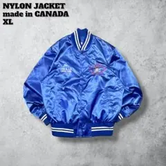 カナダ製ナイロンジャケットスタジャン90sヴィンテージ企業刺繍ブルーXL古着