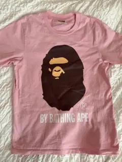 A BATHING APE® Tシャツ ピンク 猿ロゴプリント 半袖 - メルカリ