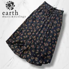 【アースミュージックアンドエコロジー】フラワープリント花柄フレアロングスカート黒
