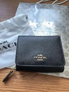 新品未使用【COACH】三つ折り財布 保存袋付き