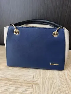 バイカラーのハンドバック