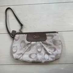 Coach コーチ　ロゴ入りクラッチバッグ ベージュ