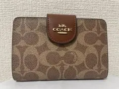 コーチ　レディース　折財布　ブラウン　小銭入れあり　新品　未使用