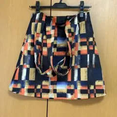 SLY 2way ストラップ付 スカート 幾何学柄 オレンジ系