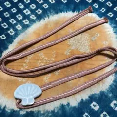 未使用　三分紐　珊瑚色　白ライン入　帯締め　正絹　約123センチ