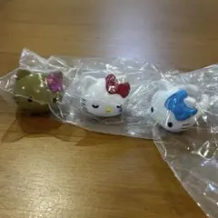 ハローキティ ガチャガチャ 指輪 日焼けキティ しくしく 水色リボン