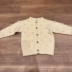 petit main ポンポン付きカーディガン アイボリー