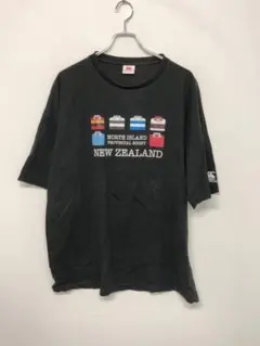 CANTERBURY 古着 ロゴ ラガーシャツ イラスト プリント Tシャツのサムネイル