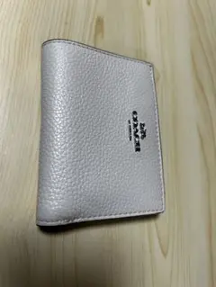 COACH 二つ折り財布 ベージュ