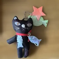 黒猫のぬいぐるみ 赤い星と緑のキャンディ付き