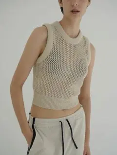 CLANE MIX BORDER SIDE HOLE KNIT TOPS - メルカリ