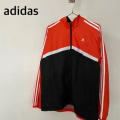 アディダス　トラックジャケット　ナイロン　アウター　ブルゾン　オレンジ　刺繍ロゴ