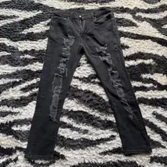 Levi's ブラック ダメージデニムパンツ