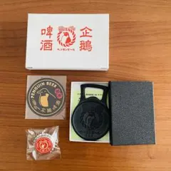 ペンギンビール　南部鉄器製栓抜き・王冠バッジ・丸型ステッカー　3点セットのサムネイル