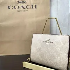 早い者勝ち！訳あり新品 COACH 二つ折り財布 ベージュ系
