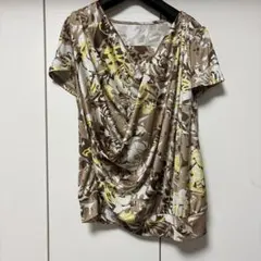 最終価格！ミッシェルクラン❤︎ボタニカル柄カシュクールトップス⭐︎伸縮性抜群！超美品のサムネイル
