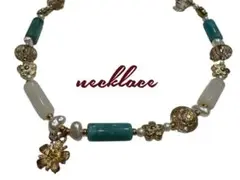 ターコイズブルーが綺麗な花チャームネックレス