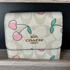 新品未使用]COACH コーチ 二つ折り財布 チェリー柄 さくらんぼ