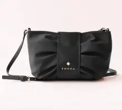 TOCCA RIBBON KNOT POCHETTE