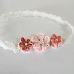 ベビーヘアバンド つまみ細工 オレンジシャーベット色 初節句 百日祝 ひな祭