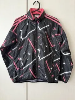 adidasアディダスレディースウィンドブレーカー 黒とピンク 幾何学模様