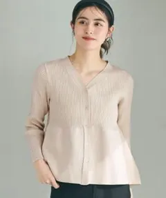 coca スポンディッシュペプラムニットカーディガン