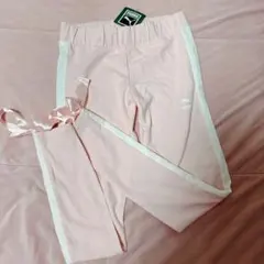 新品タグ付き　PUMAピンクリボン付きジャージスパッツジョガーパンツスエット　M