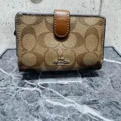 a*h様 COACHシグネチャー柄 二つ折りコンパクトウォレット