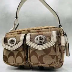 美品 コーチ ショルダーバッグ ブラウン キャンバス ポーチ ターンロック