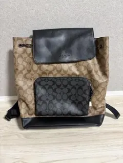 【美品】COACH ロゴ入りリュック ベージュ・黒のサムネイル