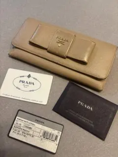 PRADA リボン付き長財布 ベージュ　サフィアーノ　カード付き