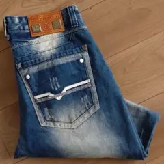 DIESEL ダメージジーンズ/デニムパンツ/イタリア製/古着/実寸W33L26