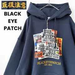 【新品✨タグ付き】ブラックアイパッチ 取扱注意 刺繍ロゴ ラベル フーディ 紺Lのサムネイル
